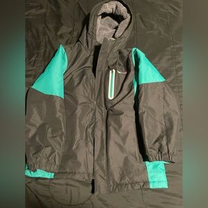 Black and mint colored winter coat